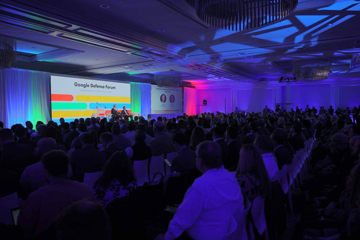 Overzicht van het panel vanuit de zaal in Pentagon City