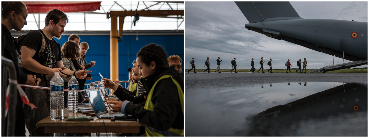 Medewerkers van Buitenlandse Zaken in gele hesjes controleren paspoorten van rolspelers. Daarna lopen zij het vliegtuig in.
