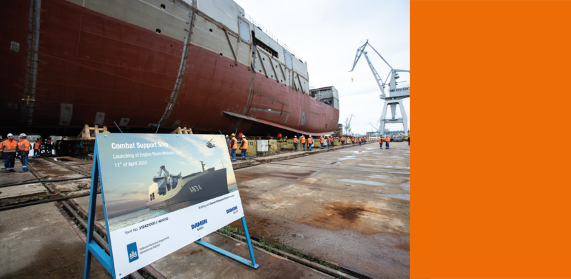 Een bord van scheepsbouwer Damen voor het nieuwe Joint Support Ship.