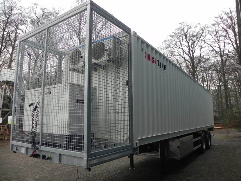 Een afbeelding van een trailer met container.