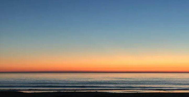 Afbeelding van een zonsondergang.