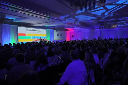 Overzicht van het panel vanuit de zaal in Pentagon City