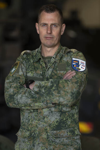 Een portretfoto van commandant 435 Herstelpeloton sergeant-majoor Werner.