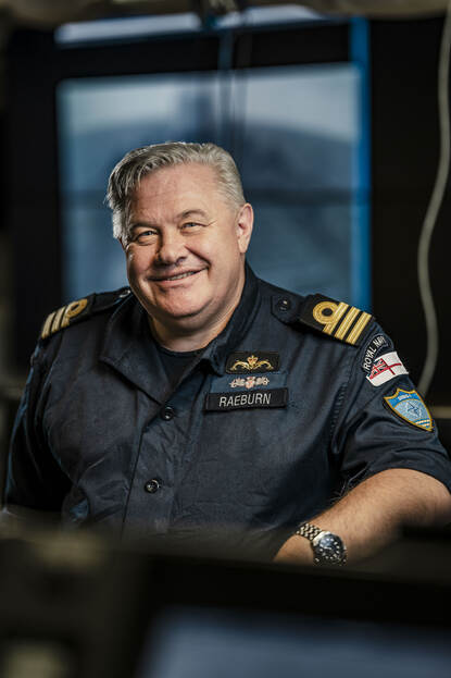 Portretfoto van overste Craig Raeburn.