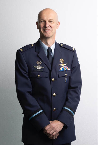 Portret commodore Henk Doorten.